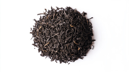 Fototapeta premium Loose black tea leaves arranged in a circular shape on a white surface
