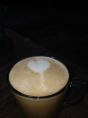 drink latte coffee in the shape of a heart