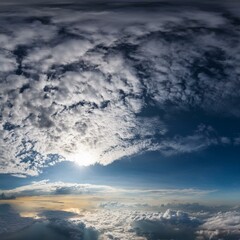 Naklejka premium dramatic mystical sky with gray heavy clouds and faint back sunlight and lumen artistic panoramic picture for the original background layout or decoration