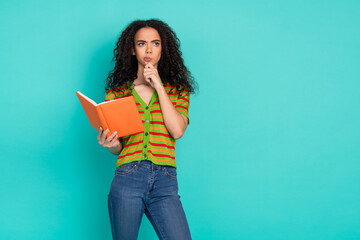 Photo portrait of lovely young lady look skeptical empty space reading dressed stylish striped...