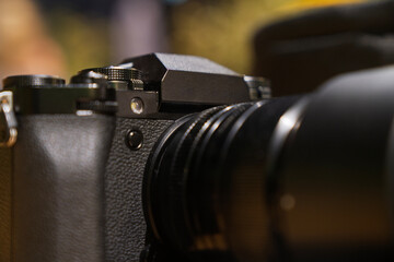 A camera lens is shown in a close up