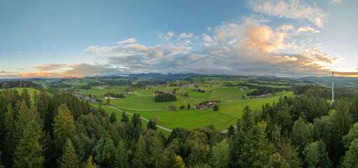 Obraz premium panoramic aerial photo near sunset in the Allgäu Alps next to village of Oberreute, Bavaria, Germany