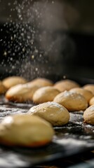 A tray of baked goods covered in powdered sugar