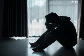 Silhouette of lost cast long shadow, embodying deep despair and hopelessness left him feeling...