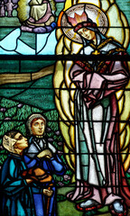 2024-08-01, Paris, FRANCE. Stained glass of The apparition of Our Lady of La Salette to the two little shepherds. .