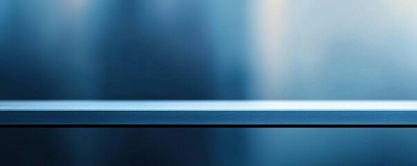 Abstract blue background with smooth gradient and subtle texture.