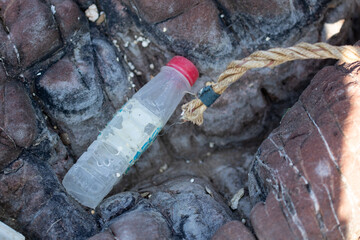 Fototapeta premium bottle waste on the beach