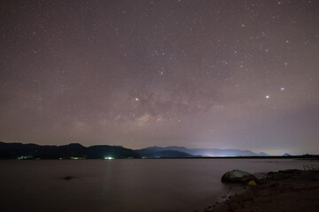 A star at nigh sky with cloudy