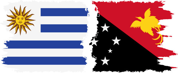 Papua New Guinea and Uruguay grunge flags connection, vector