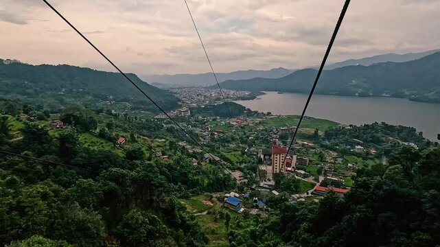 View of Himalayan mountain ranges from a moving cable car in Nepal