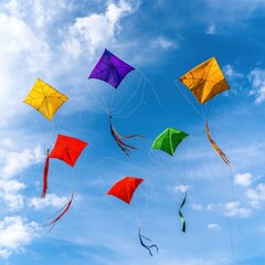 Colorful kites soar against a bright blue sky, creating a vibrant scene of joy and freedom, perfect for a sunny day of outdoor fun.