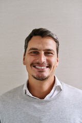 Fototapeta premium Business man, portrait and smile in office with confidence and happy from lawyer work and career. Professional, attorney and labour law firm with corporate style and fashion with employee from Sweden