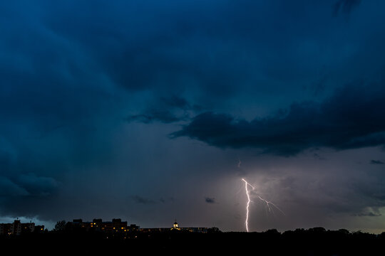 lightning flashes in the night sky