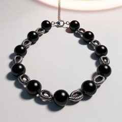 Fototapeta premium Oxidized silver chain with onyx beads bold and mysterious