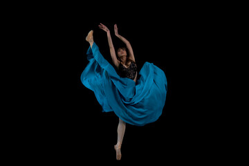 woman dancing in the dark. ballet dancer posing. ballet dancer in black. woman dancing in the dark. woman dancing in studio. woman dancing.