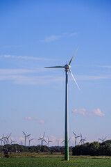 Fototapeta premium Wind turbines in the landscape by the North Sea in Lower Saxony Germany