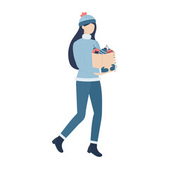 A girl carries a bag full of Christmas tree decorations.