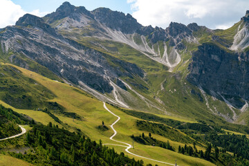 Wide view of mountain peak with paths