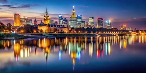 night panorama of warsaw reflected in the wisla river