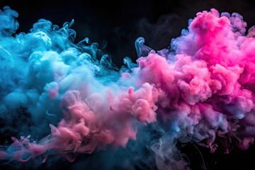 Fototapeta premium Colorful smoke billowing in pink and blue hues for gender reveal party