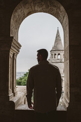 Young tourist on his back in the fishermen's bastion