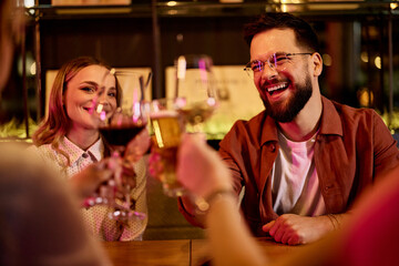 Friends Enjoying Drinks at a Vibrant Night Out Celebration