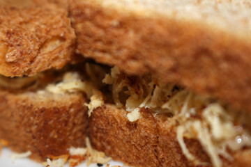 close up of bread. sandwich with selective focus. bread with shredded chicken. chicken sandwich.