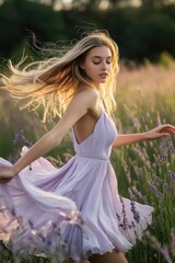 Obraz premium A woman strolling through a beautiful field of purple lavender, surrounded by nature