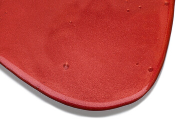 Scarlet coral brick red lip gloss with shimmer textured on white background