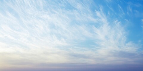 Blue sky with beautiful white clouds. Sky with cumulus and cirrocumulus clouds. Panoramic image of the sky.