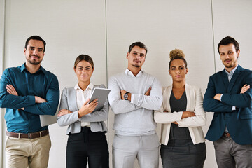 Portrait, team and business people with arms crossed in office for solidarity, about us or integrity. Group diversity, pride and confident staff together with tablet for risk management at enterprise