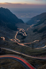 Transfagarasan mountain road with car light trails