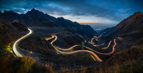 Transfagarasan mountain road with car light trails