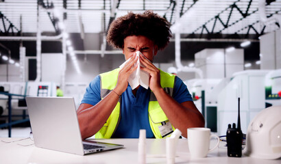 Sick Factory Employee Sneeze At Work
