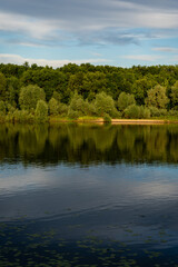 Tranquil river in a lush green park