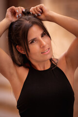 Close-up of a young woman on the street posing in Menorca