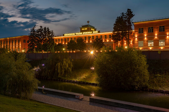 TULA, RUSSIA - JULY 14, 2024: Embankment of the Upa River and workshops of the Imperial Tula Arms Factory on a July night