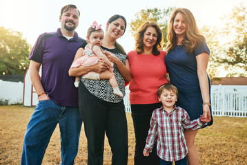 Love, portrait and smile with big family in garden for peace, summer and vacation. Relax, care and adventure with parents and children at home in backyard for holiday, bonding and happiness together