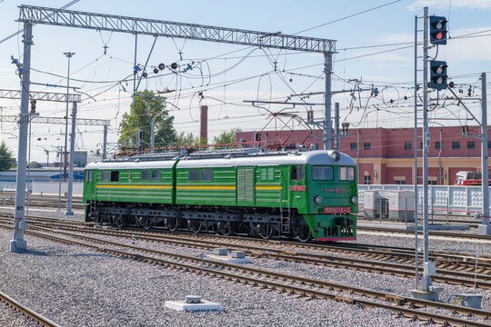 SAINT PETERSBURG, RUSSIA - AUGUST 27, 2023: Soviet two-section mainline electric locomotive VL8 (N8) on the station tracks on a sunny summer day