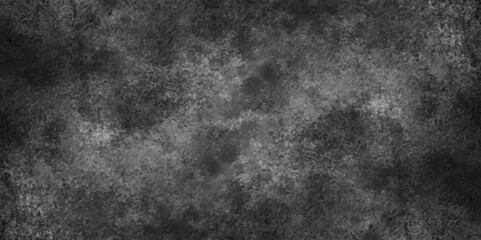 Black and white grungy background or texture, featuring a haze of soft gray tones and abstract patterns. black backdrop concrete texture background banner pattern. dark paper texture background.