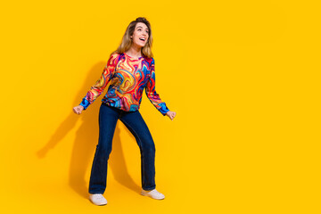 Photo portrait of young funny blonde hair adorable woman wearing casual style outfit clubbing isolated on yellow color background