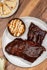 BBQ Ribs on plate in restaurant