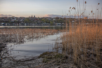 view of the evening city across the river