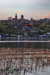 view of the evening city across the river