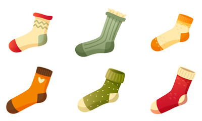 Set of stylish cotton and wool socks with different textures, colors, patterns and types. One sock on a white background. Warm wool socks with cute patterns. Autumn and winter socks.