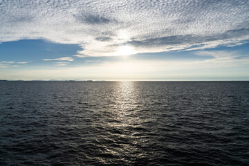 Obraz premium sunset in the cloud over the sea