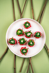 Vibrant Sushi Bites Topped with Fresh Seaweed