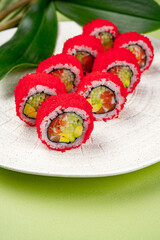 Vibrant Red Caviar Sushi Rolls with Fresh Avocado and Salmon