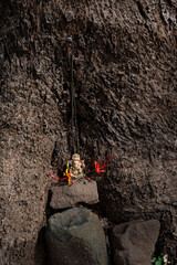 Weathered stone staircase leading to an arched entrance at Saptakoteshwar Temple, Diwar Island, Goa &ndash; centuries-old architecture in a sacred setting.