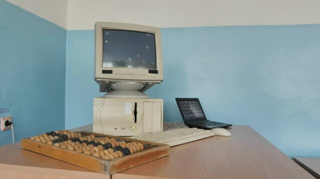 Old Style PC, Laptop And Vintage Abacus Together. Concept: Development Of Computing Technology
